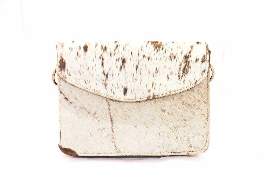 The Rusty Spur Co. Cowhide Handbags