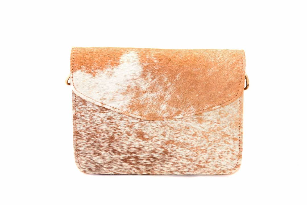 The Rusty Spur Co. Cowhide Handbags