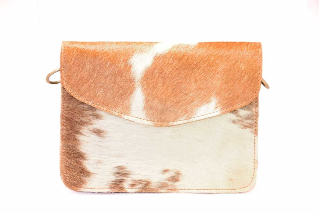 The Rusty Spur Co. Cowhide Handbags