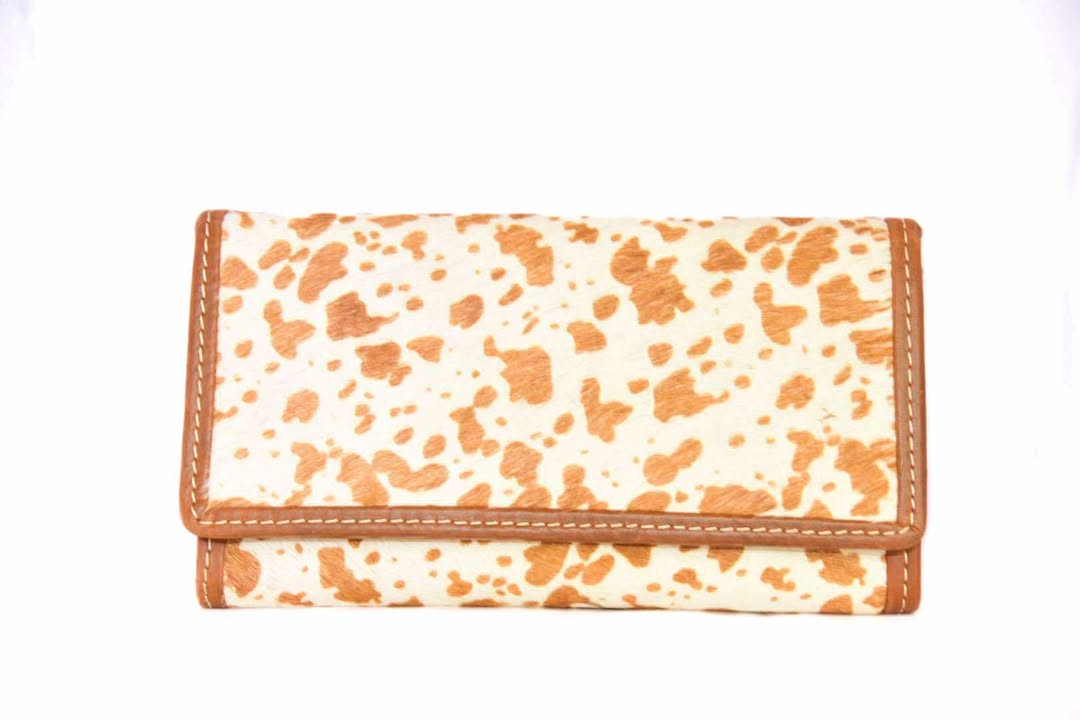 The Rusty Spur Co. Cowhide Purses